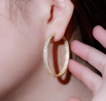 Double-view cubic zirconia hoop earrings by Zirconite, worn on model, 826E05