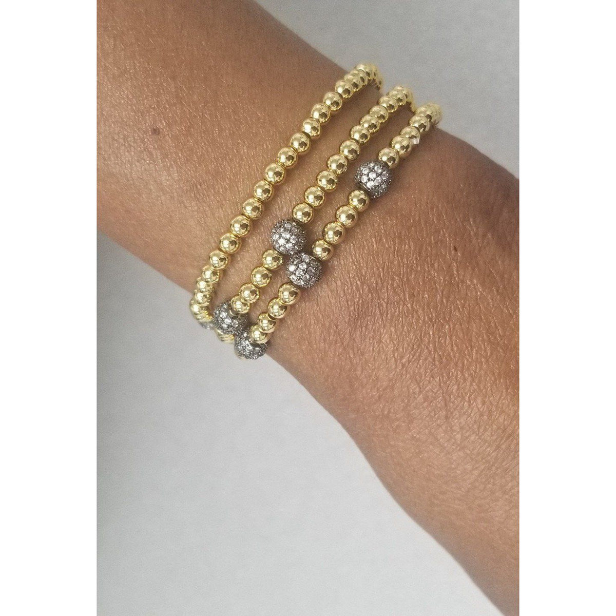Non-tarnish gold bead stretch bracelet by Zirconite, alternate view, 655B
