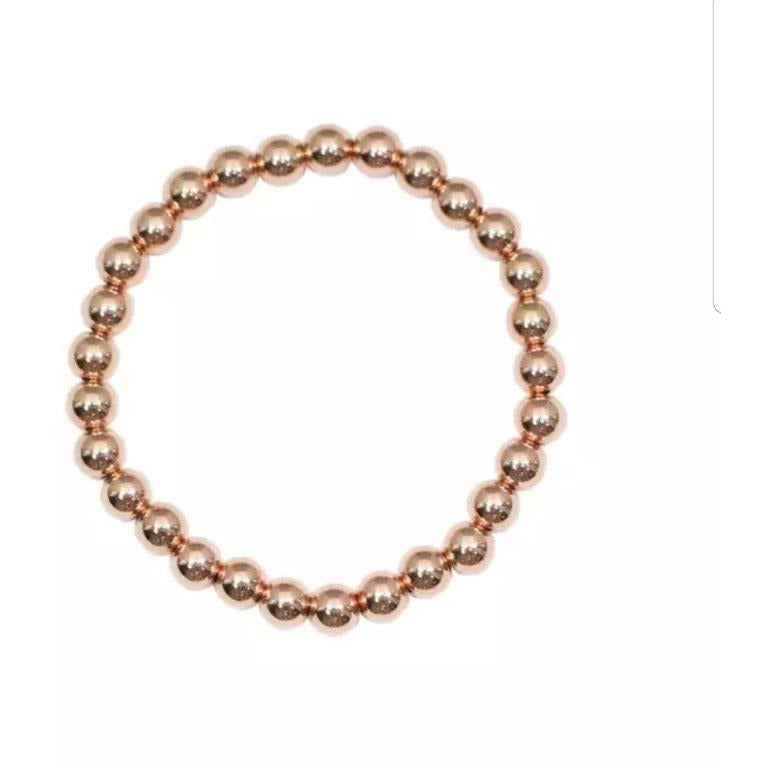Non-tarnish gold bead stretch bracelet by Zirconite, rose gold tone, 655B