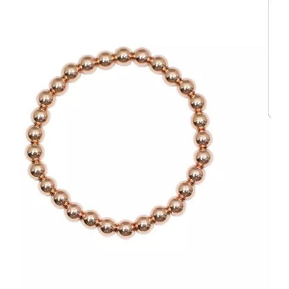 Non-tarnish gold bead stretch bracelet by Zirconite, rose gold tone, 655B