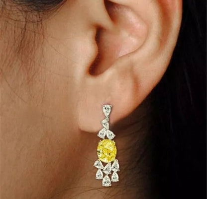 Oval cubic zirconia drop earrings, worn on model, 830E1032