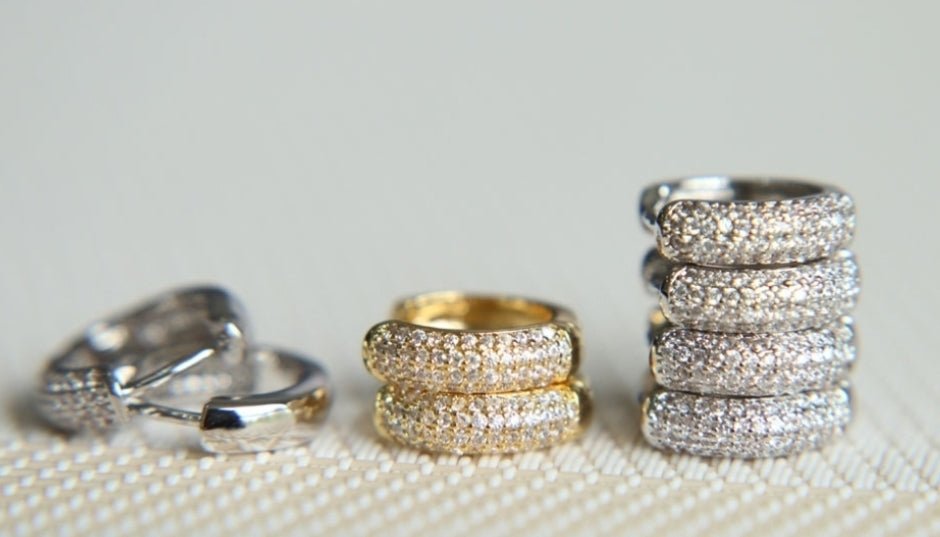 Pavé cubic zirconia huggie hoop earrings by Zirconite, main view, 501E11220