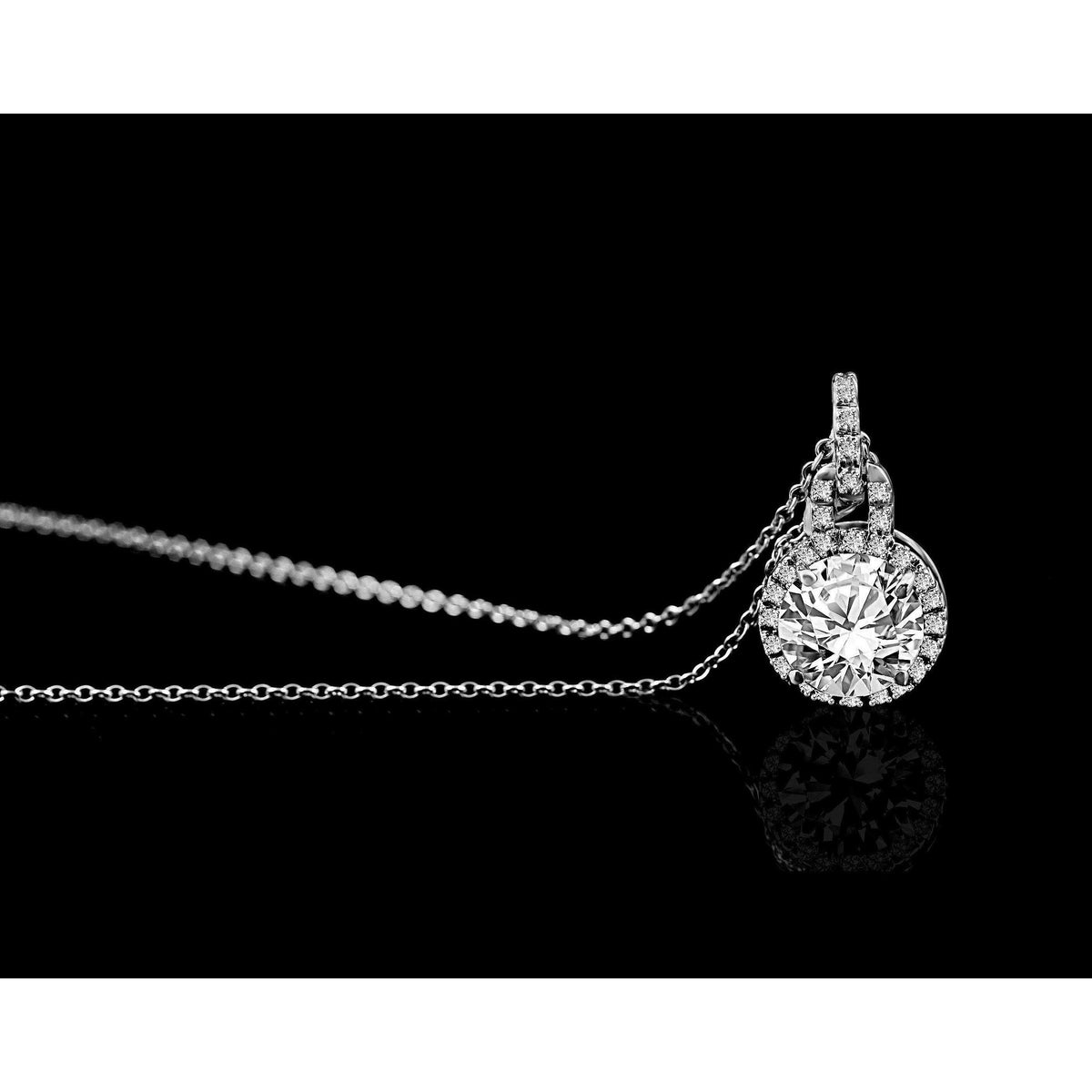 Round cubic zirconia halo pendant and earrings set in sterling silver, alternate view, 635P10732S