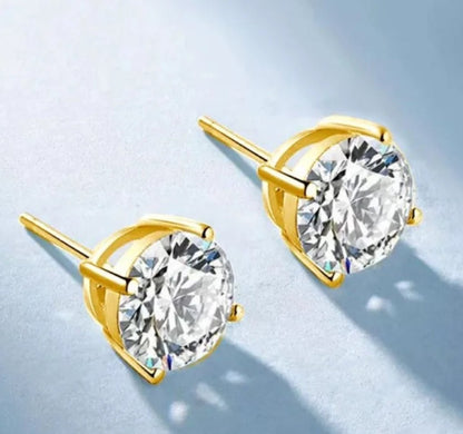 Round cubic zirconia stud earrings in 14K gold, close-up view, 635E14K