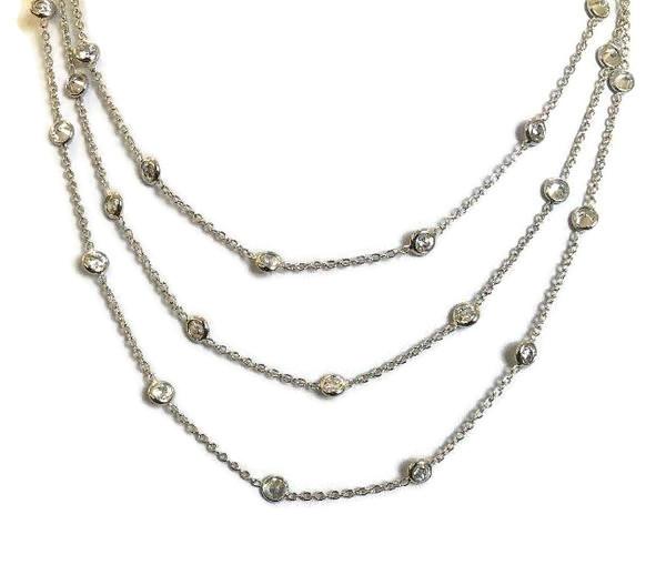 Three-row graduated cubic zirconia station necklace in sterling silver by Zirconite, main view, STN229X3