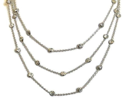 Three-row graduated cubic zirconia station necklace in sterling silver by Zirconite, main view, STN229X3